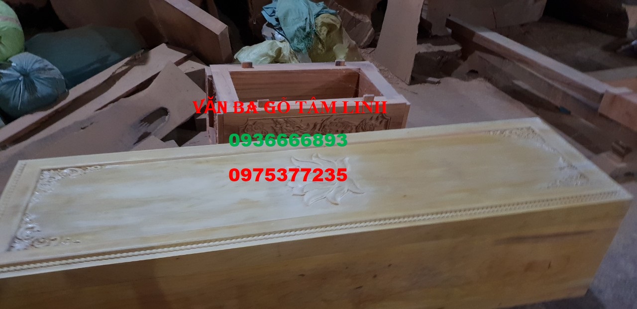 quan tài gỗ vàng tâm