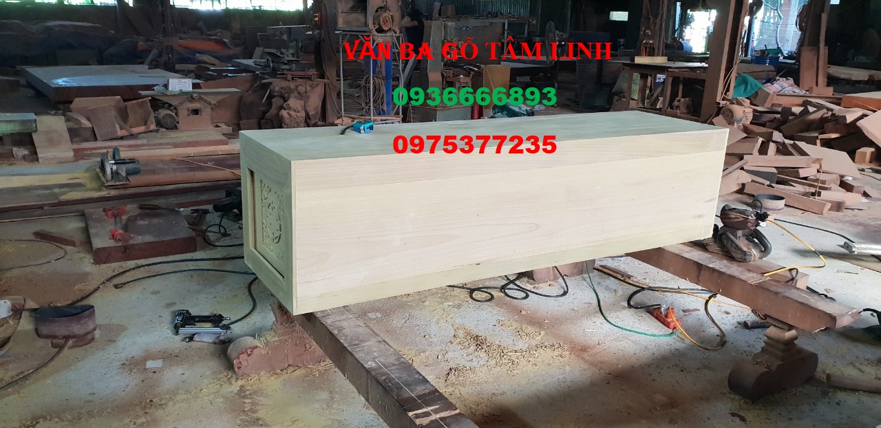quan tài gỗ vàng tâm