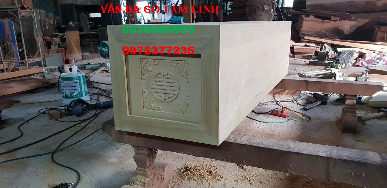 quan tài gỗ vàng tâm