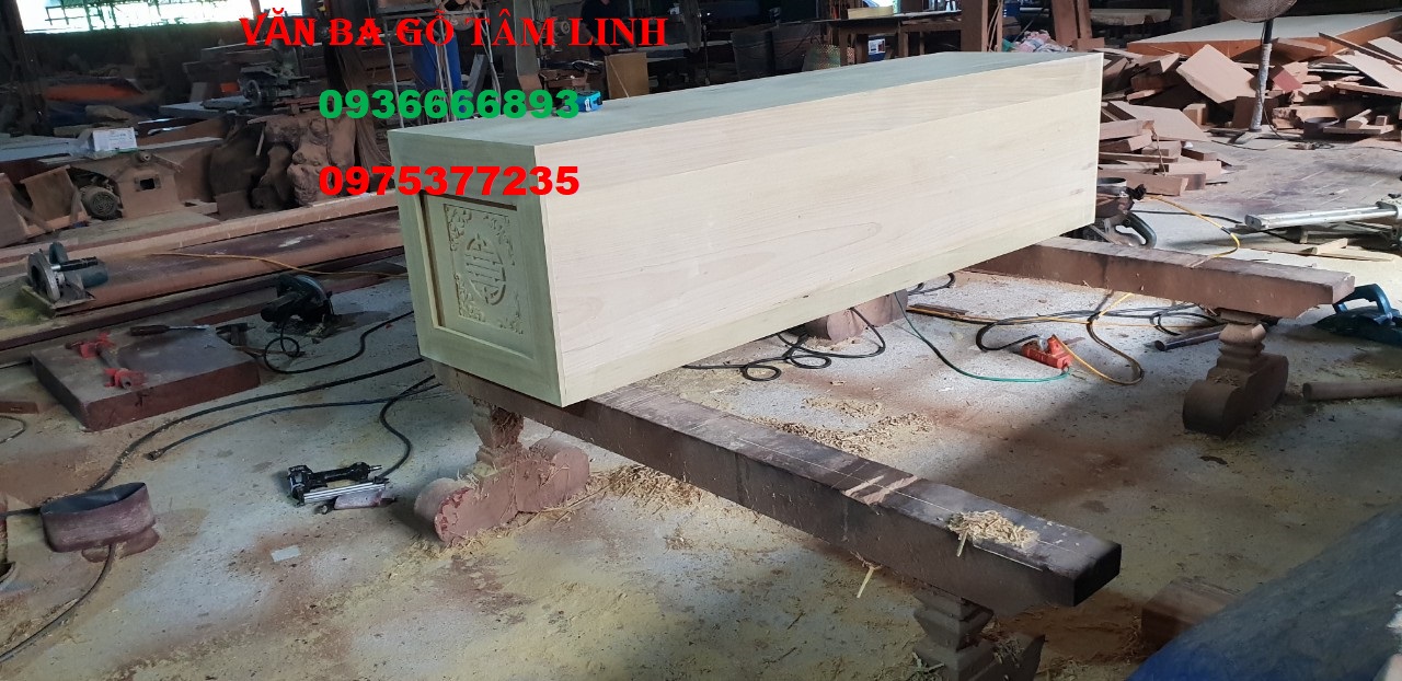 quan tài gỗ vàng tâm