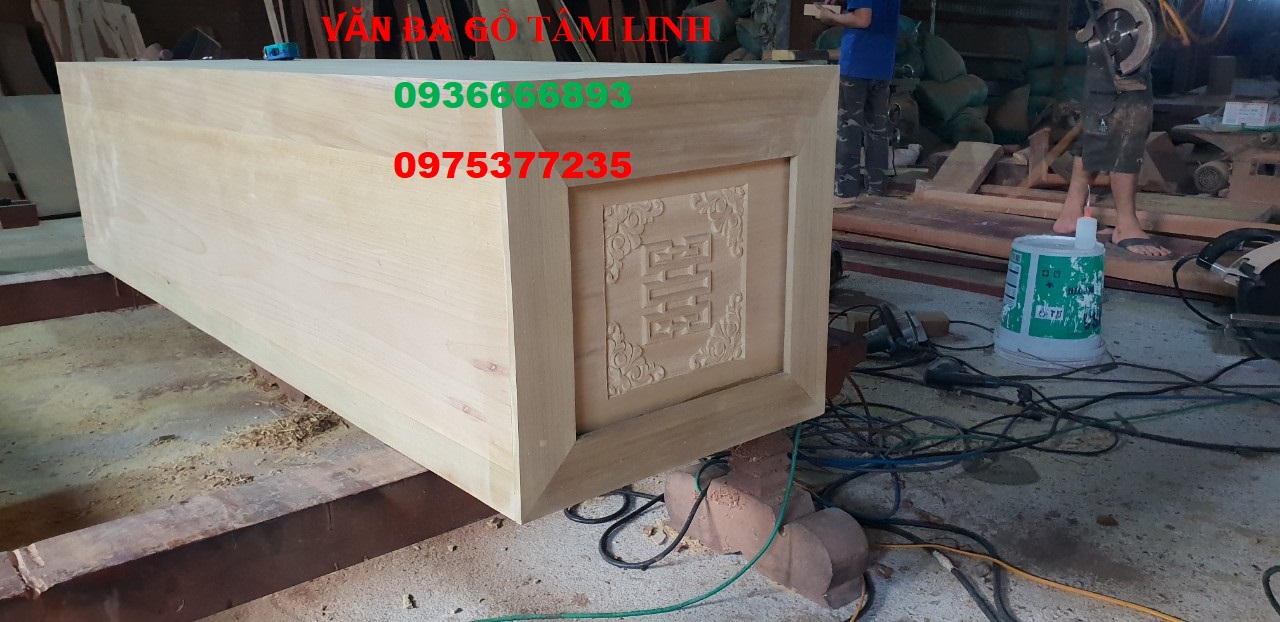 quan tài gỗ vàng tâm