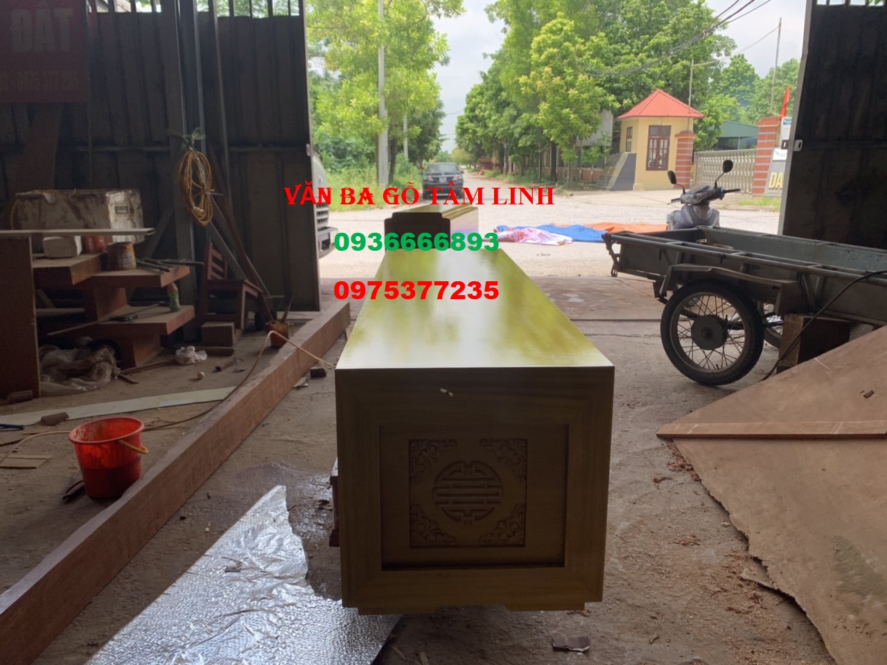 quan tài gỗ vàng tâm