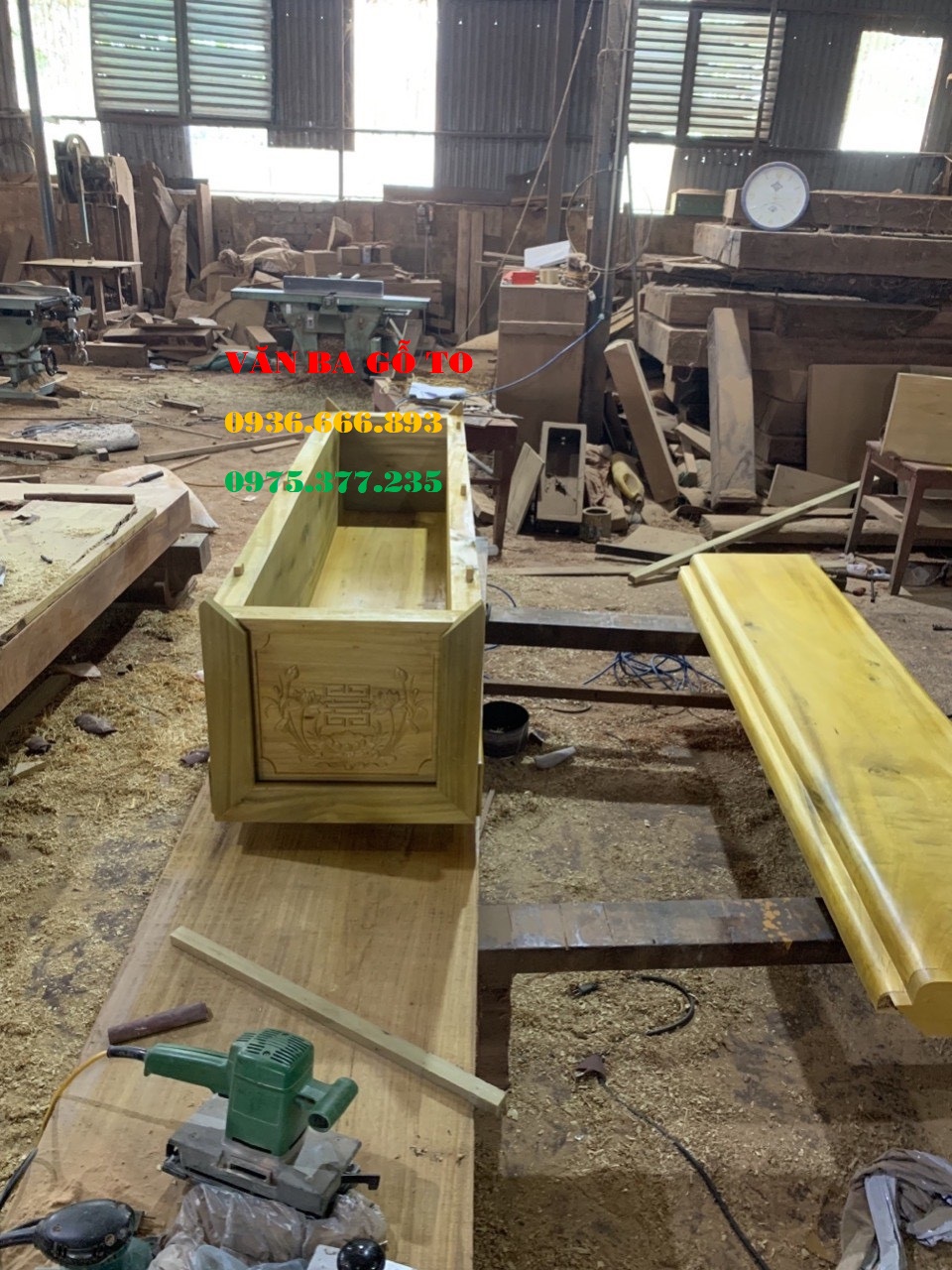 quan tài gỗ vàng tâm