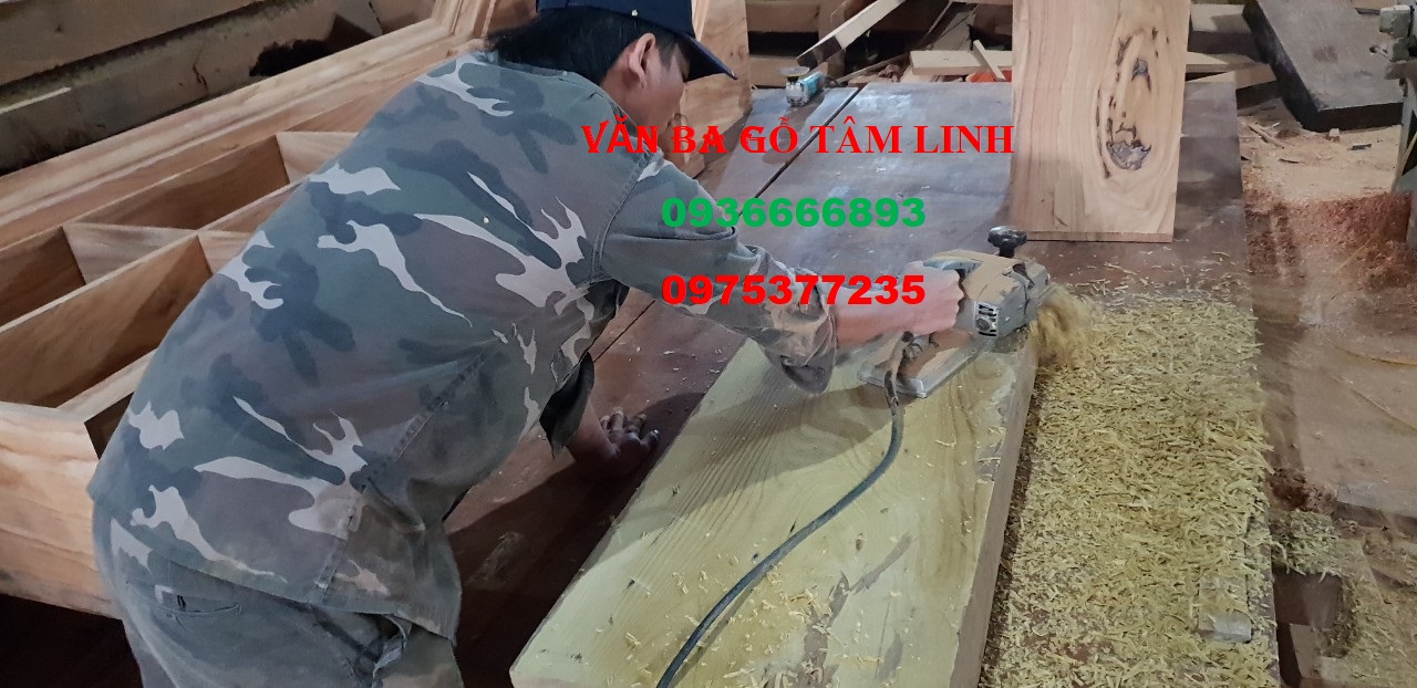 quan tài gỗ vàng tâm